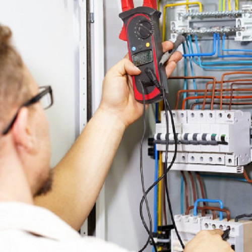 bigstock_electrician_measures_voltage_w_269552209